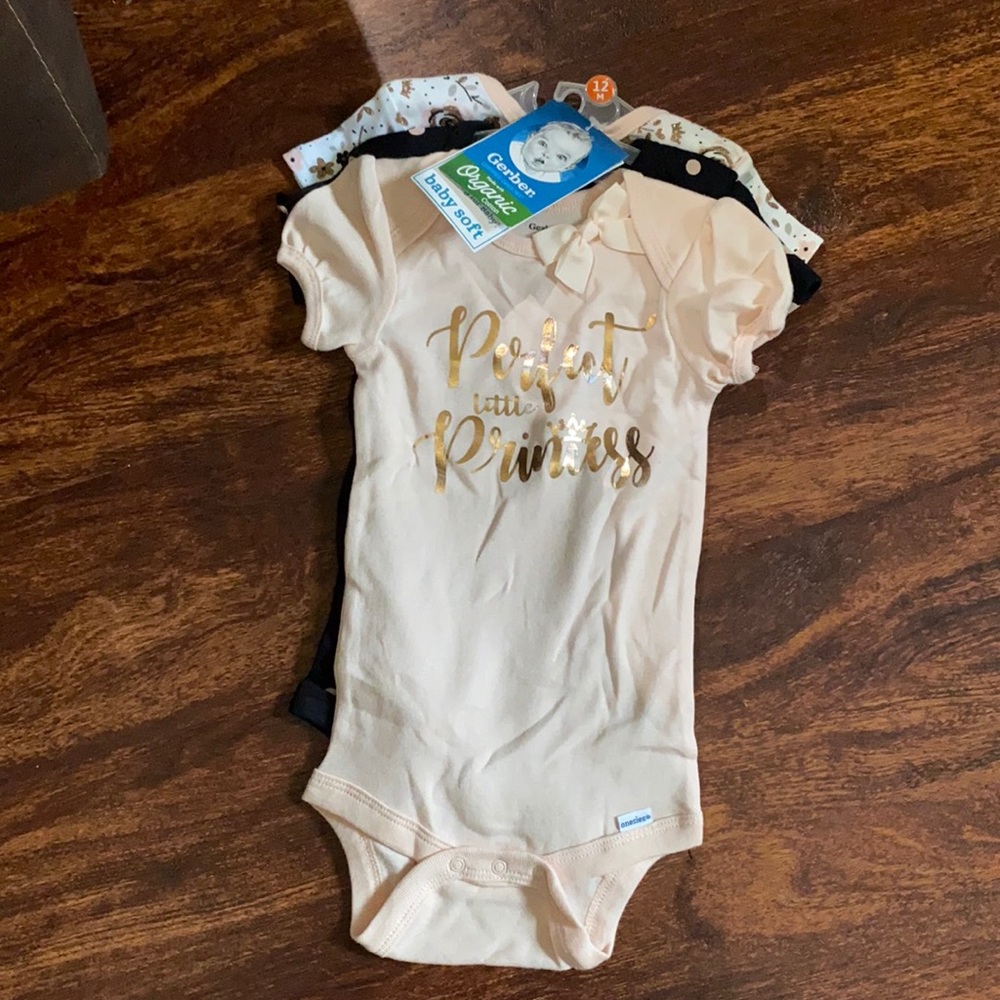 3 baby onesies